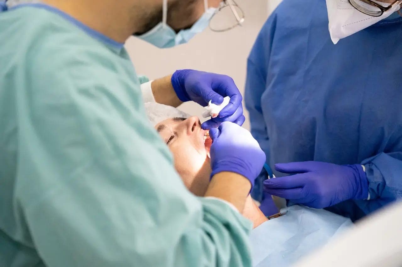 Dentist examining a patient with a broken tooth